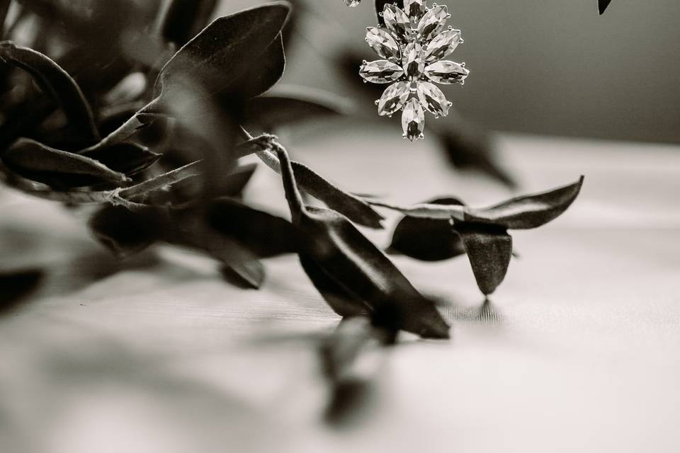 Brides earring hangs on plant