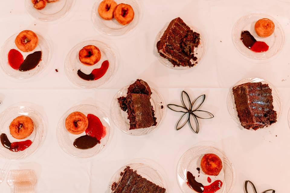 Cake and donuts on table