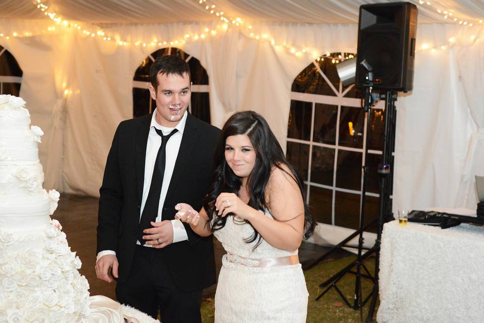 Couple getting ready to cut the cake