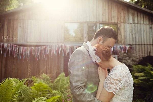 barn wedding, DIY, embrace, sun flare