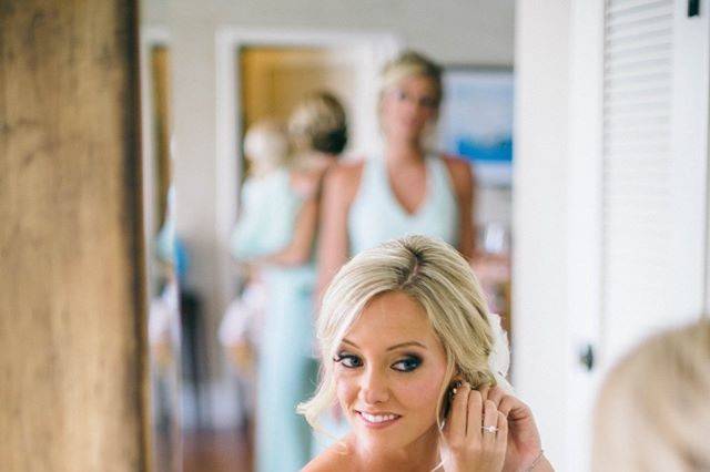 Bride wearing her earing