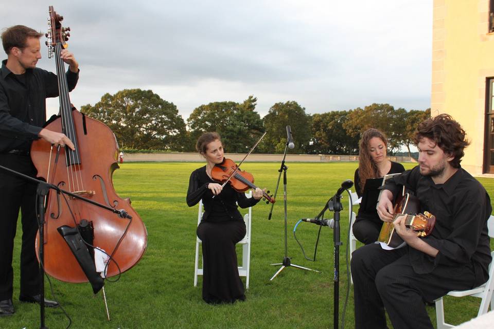 Classical quartet - bass, violin, viola & acoustic guitar at oheka castle wedding ceremony