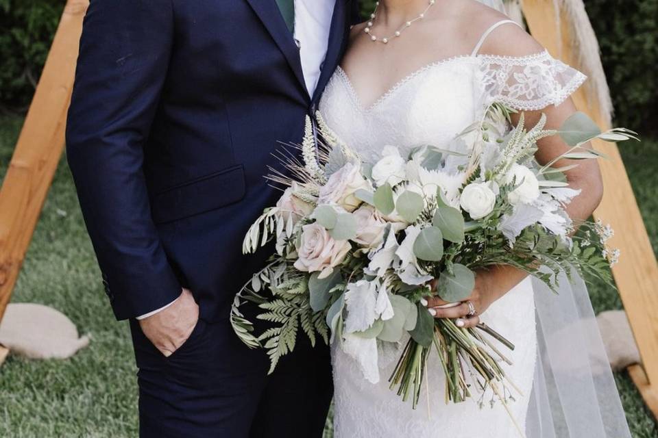 Couple with boho arch