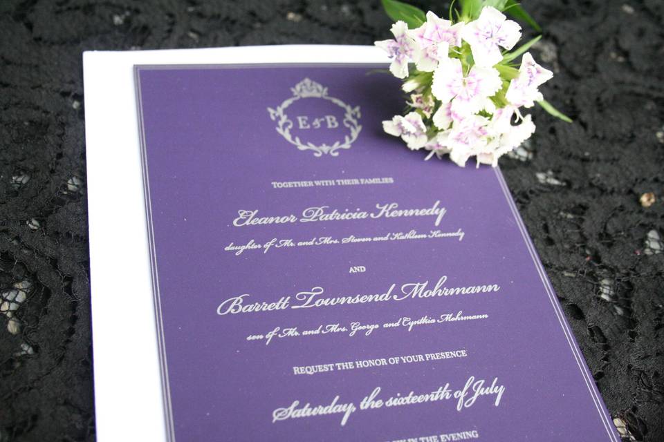 Violet invitation with white envelope