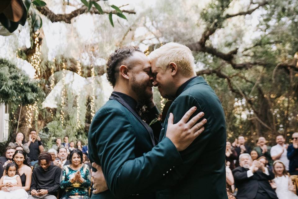 Two grooms at the alter