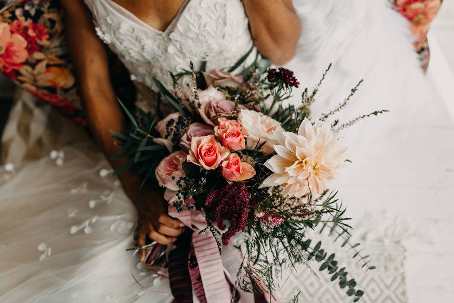 Bridal bouquet in moody colors: Inner Images Photography