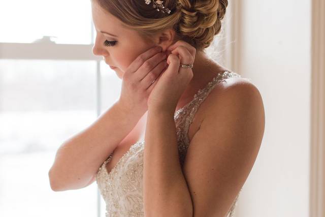 Putting on earrings