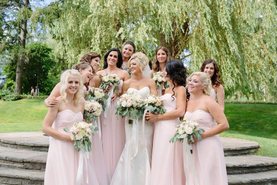 Bridesmaids wearing blush dresses