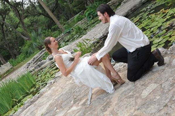 Groom on his knee