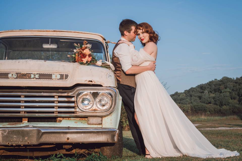 Couple on with Vintage Truck