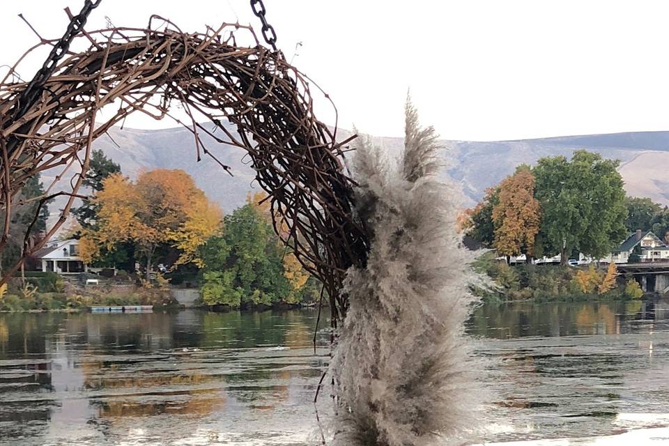 Sweetheart swing featuring pampas grass