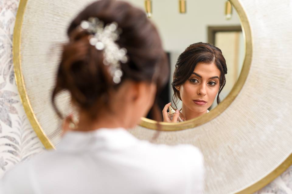 Portrait of bride by mirror