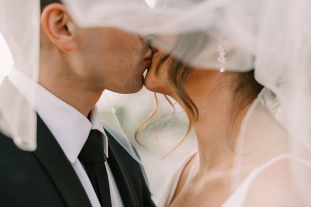 Veil shot bride and groom
