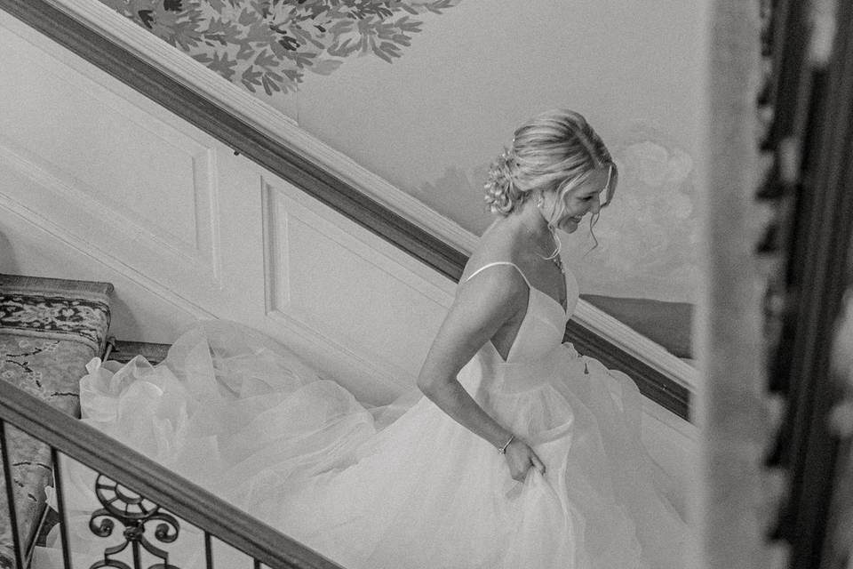 Bride walking down stairs