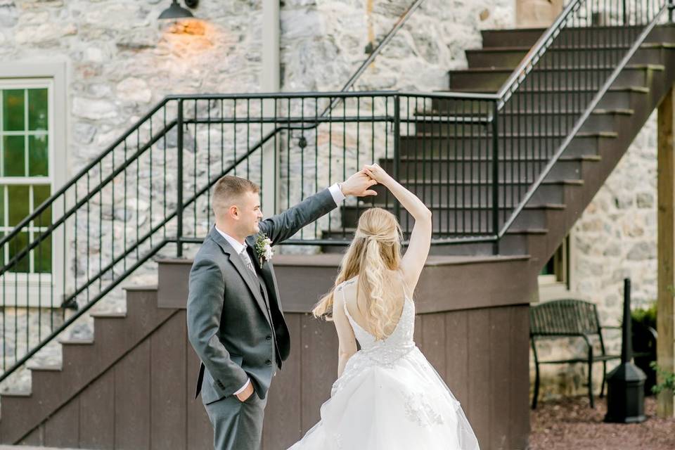 Bride and groom twirling