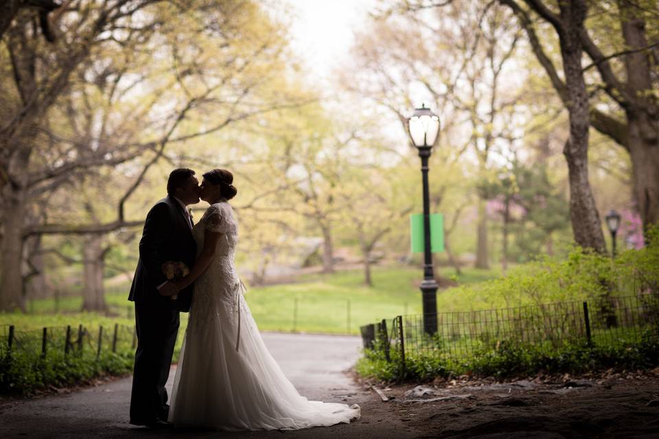 Groom and bride kissing