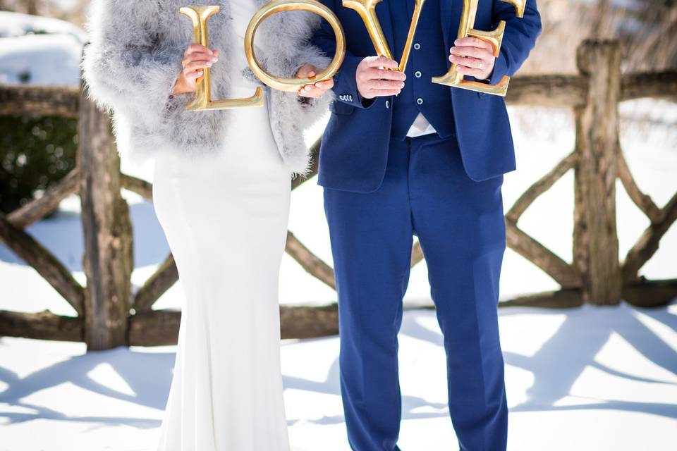 Bride and groom in the snow