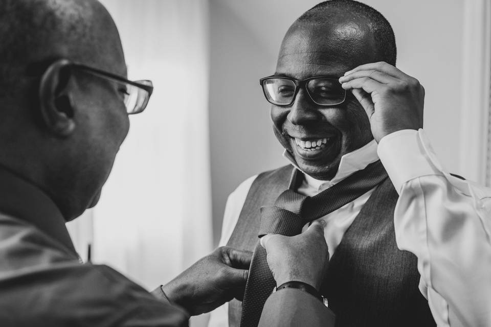 Helping with a tie