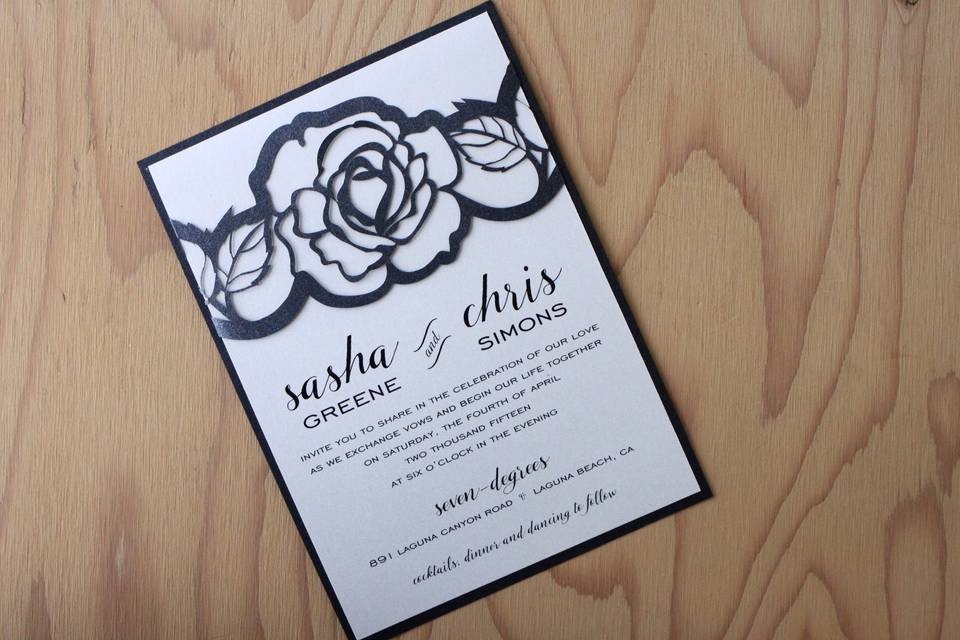 Laser cut rose banded invitation