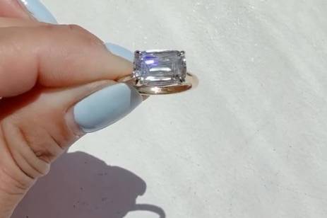 An emerald cut lab-grown diamo