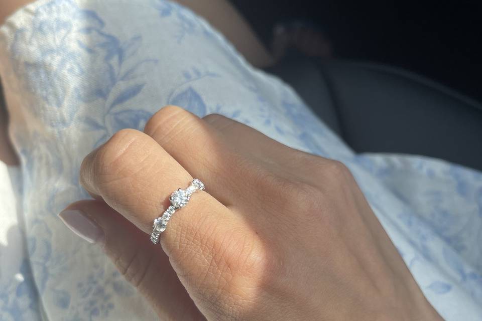 diamond-eternity-band-on-hand-blue-floral-dress-haejin-jewelry-brooklyn.jpg