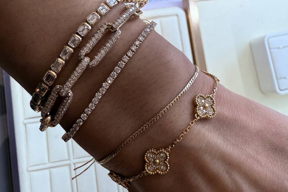 diamond-tennis-bracelets-stacked-gold-on-wrist-haejin-jewelry-brooklyn.jpg