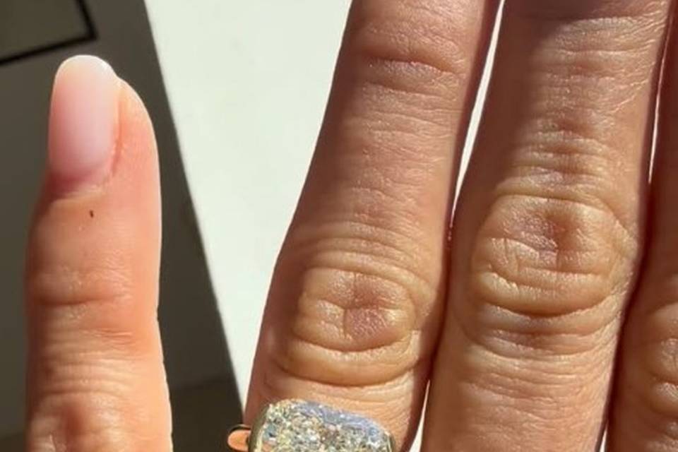 emerald-cut-engagement-ring-on-hand-close-up-haejin-jewelry-brooklyn.jpg