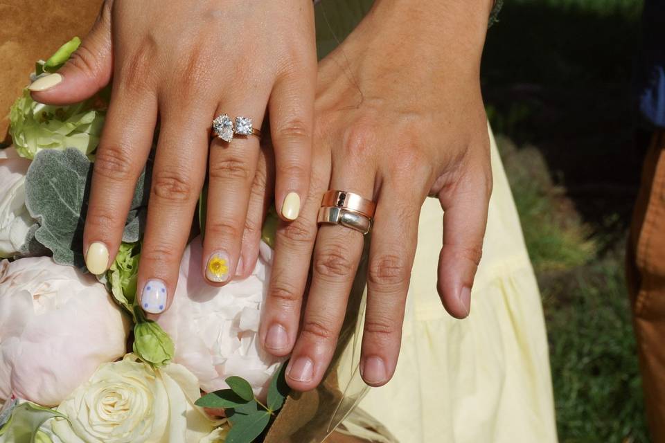 engagement-ring-on-hand-with-flowers-haejin-jewelry-brooklyn.jpg