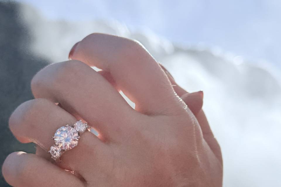 three-stone-diamond-engagement-ring-rose-gold-on-hand-haejin-jewelry-brooklyn.jpg