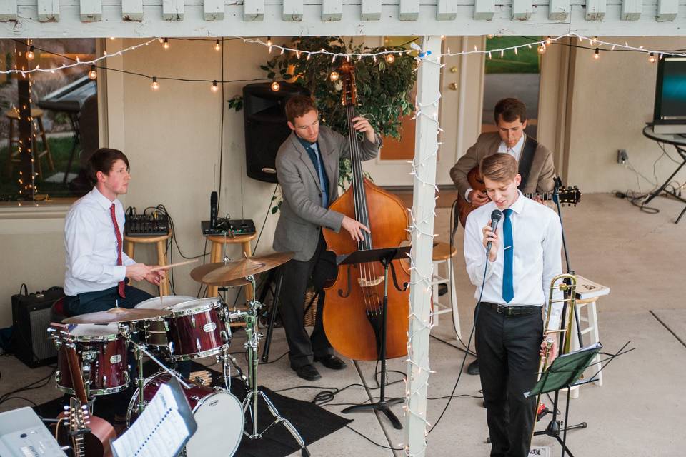 The band at a backyard wedding