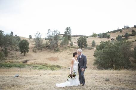 The couple with hill background