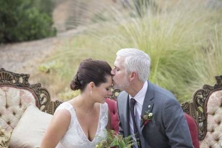 The couple with hill background