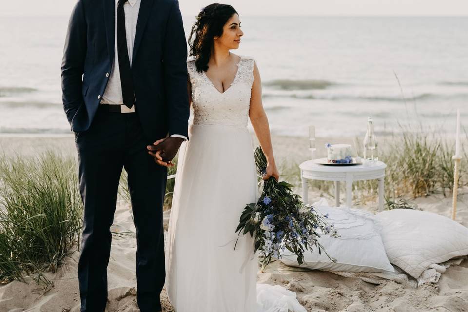 Newlyweds by the beach