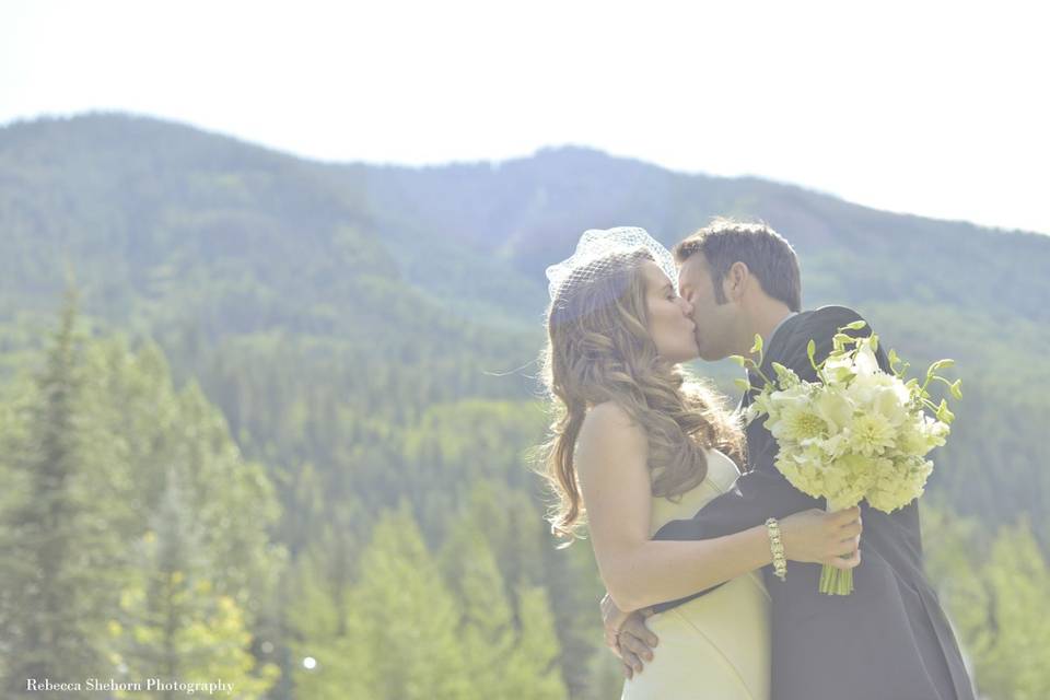 A destination wedding in the park on the grounds of the Vail Racquet Club Mountain Resort