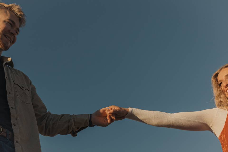 Couple holding hands