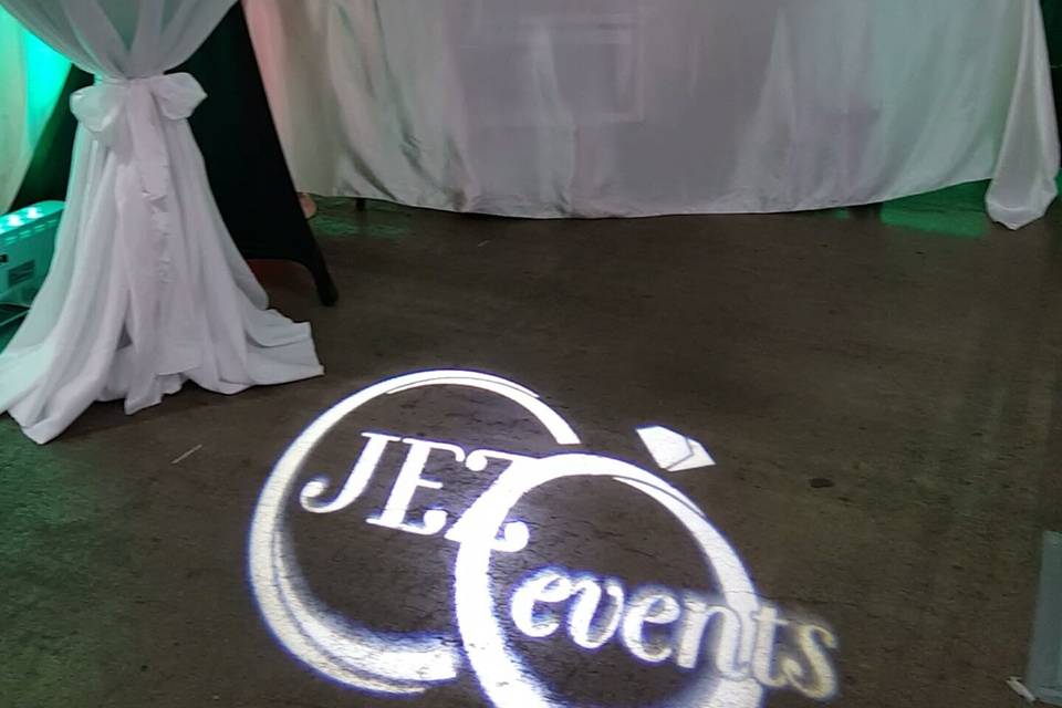 Wedding Expo booth showcasing our custom gobo image projection and RGBWA+UV Battery Powered Uplighting.