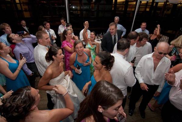 Newlyweds and their guests on the dance floor