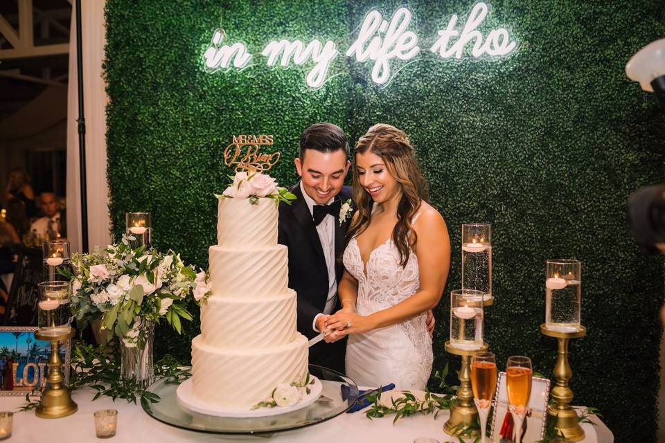 Cake cutting with custom sign