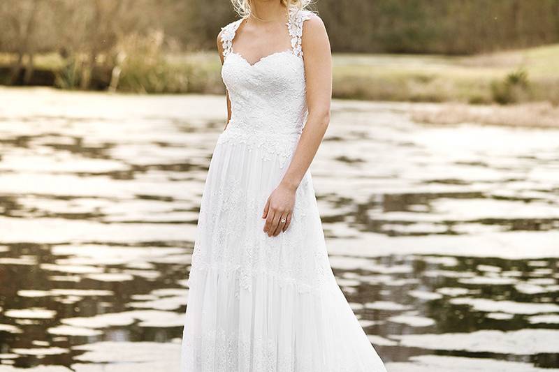 6445	<br>	Offbeat styling is brought to life in this chiffon and cotton lace mini high-low gown with a high neck, keyhole back, natural waist, and trimmed hem. Complete the look with the addition of veil style 6445V.