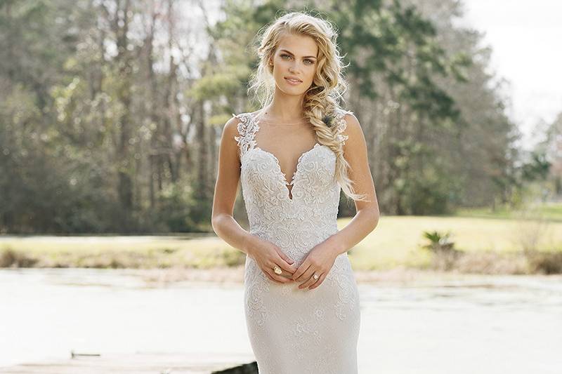 6450	<br>	Look romantic in this strapless fit and flare lace and tulle gown with sequined lace appliques, lace up back, and chapel train. Gown available with a zipper closure as style 6450Z.