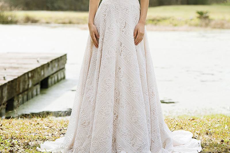 6455	<br>	Float down the aisle in this airy tulle and lace gown with a sweetheart neckline, cold shoulder, self-tie belt at the natural waist, and cage silhouette.