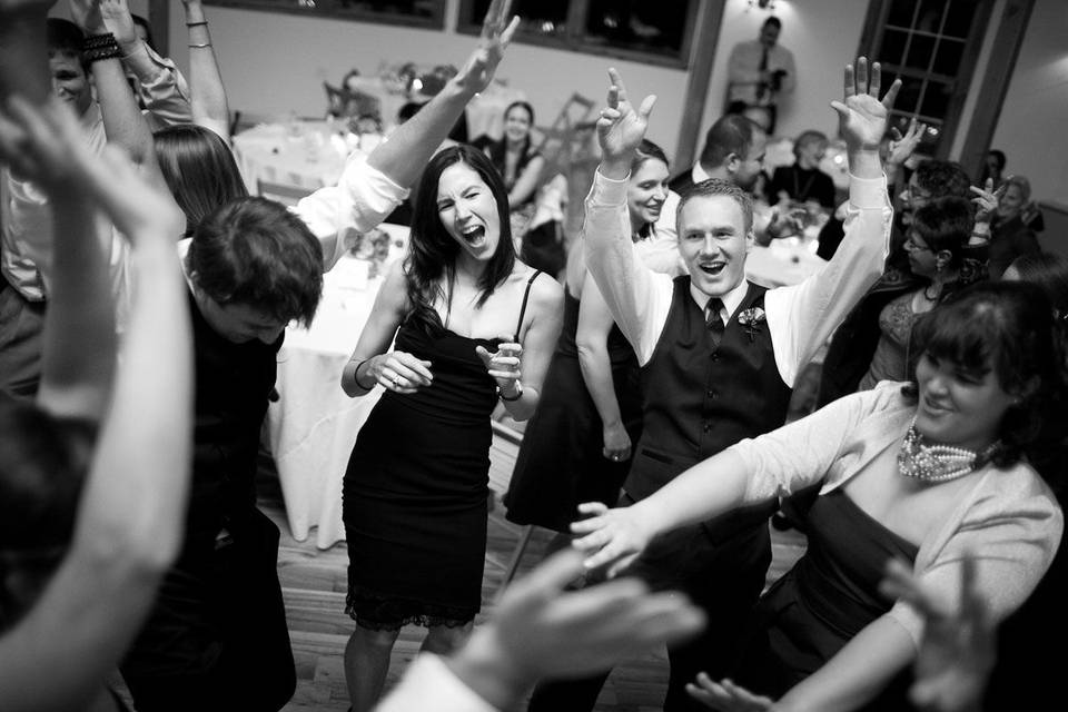 Couple and guests dancing