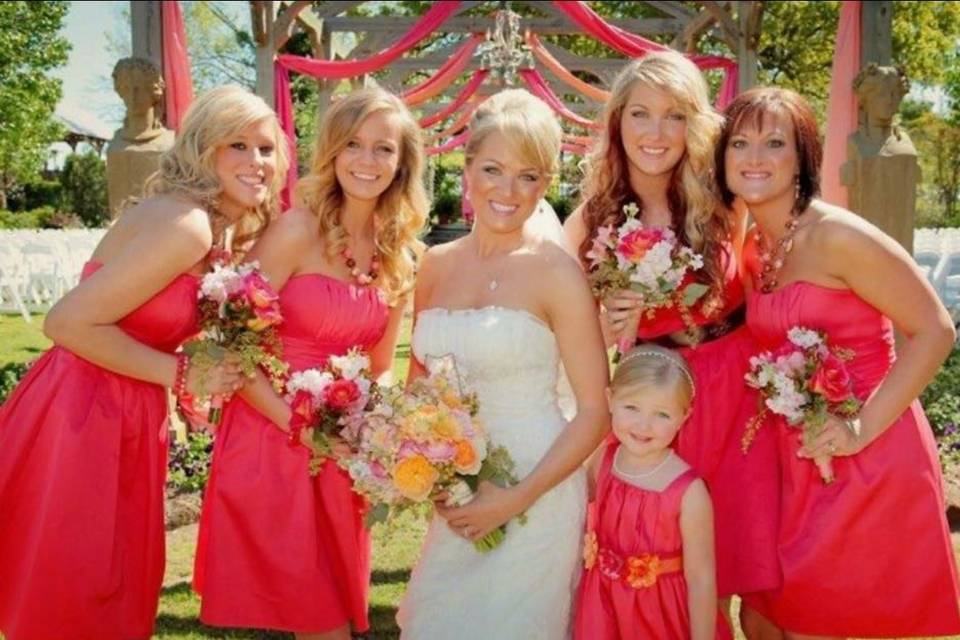 Bride, bridesmaids, flower girl