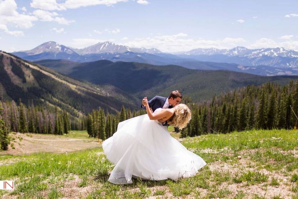 Groom kissing his bride