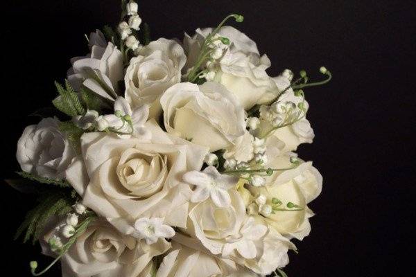 Diamond Rose Bouquet with Lilies of the Valley and Stephanotis.