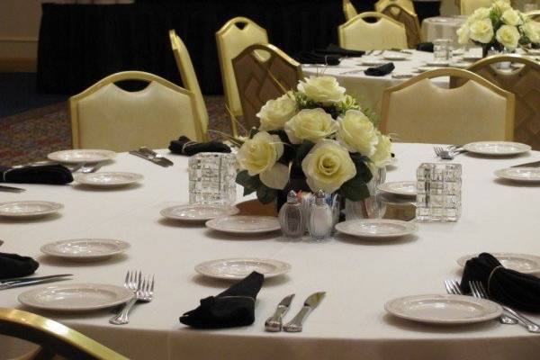 Small rose centerpieces.