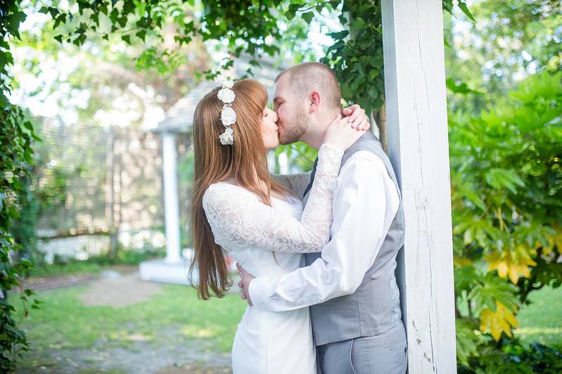 Kissing beneath the porch