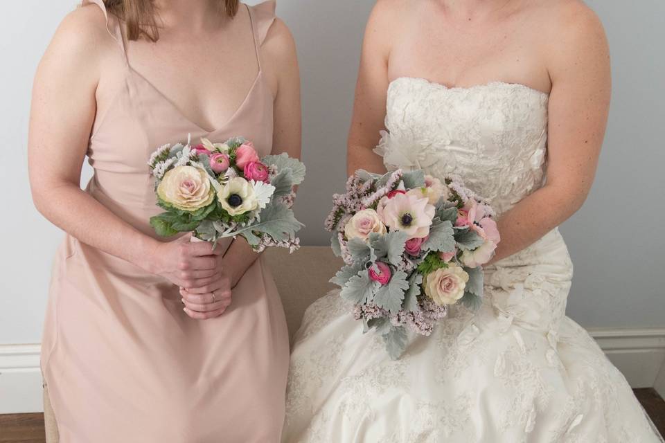 Women holding bouquets