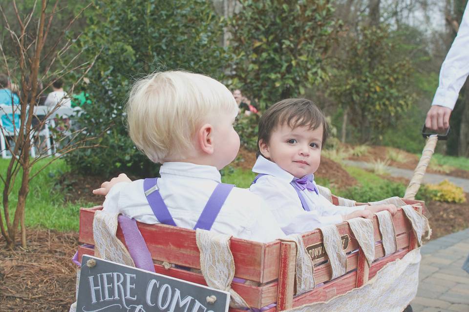 Junior groomsmen getting a lift