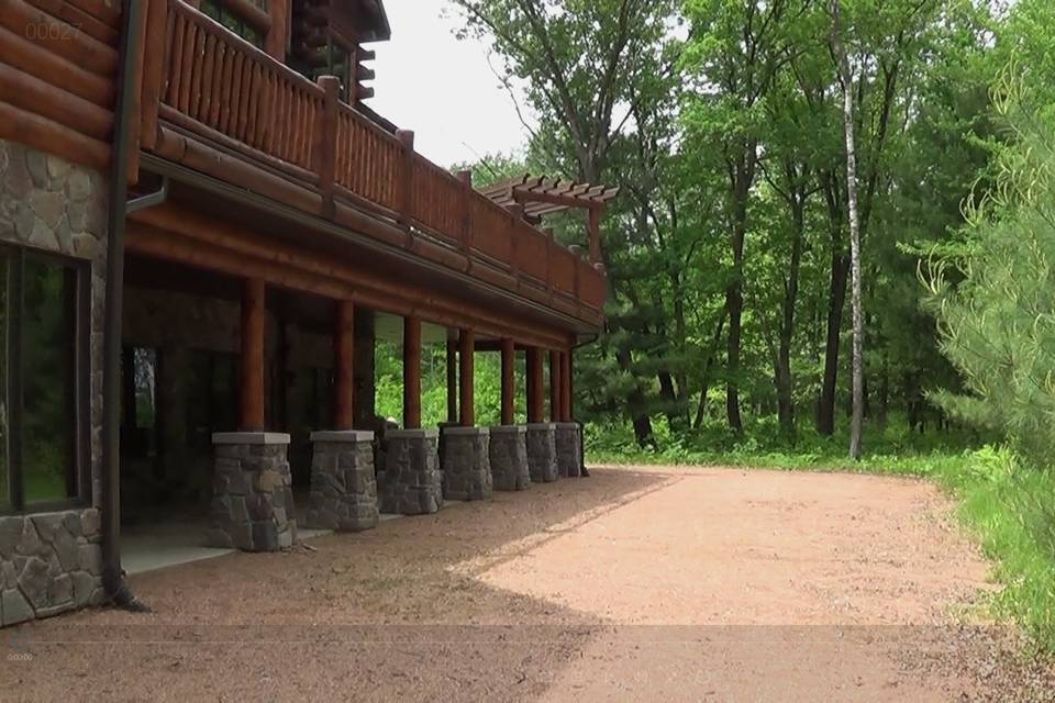 Backyard area - lower level cement patio area and small size gravel. Tables can also be set up here in good weather